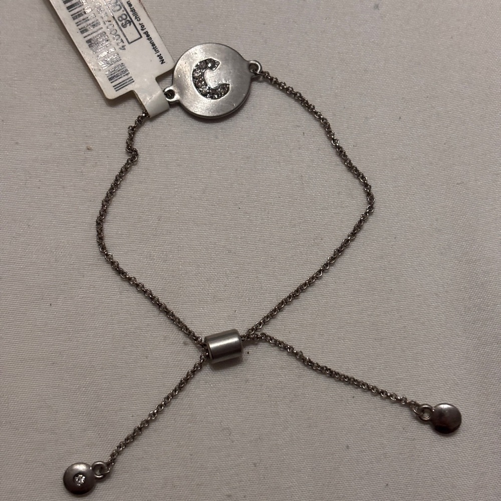 Women’s silver-tone chain charm slider bracelet, featuring C" charm.